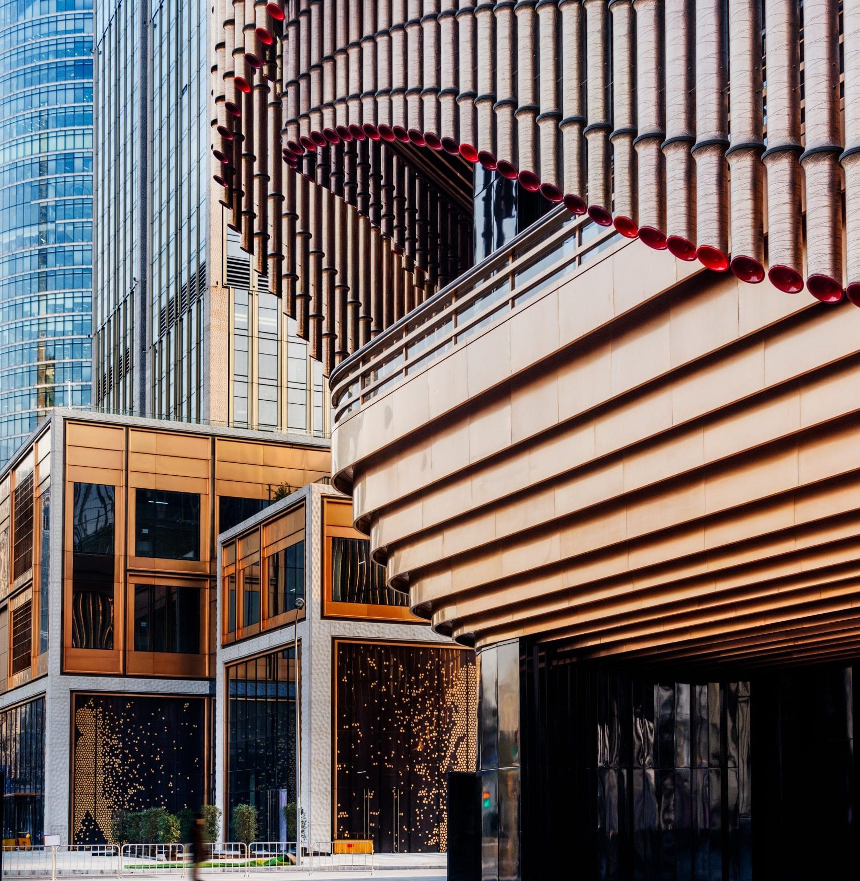 square front of modern office buildings in Shanghai financial district.